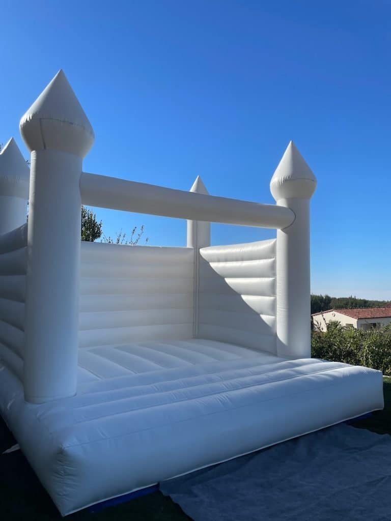 White bounce house rental.