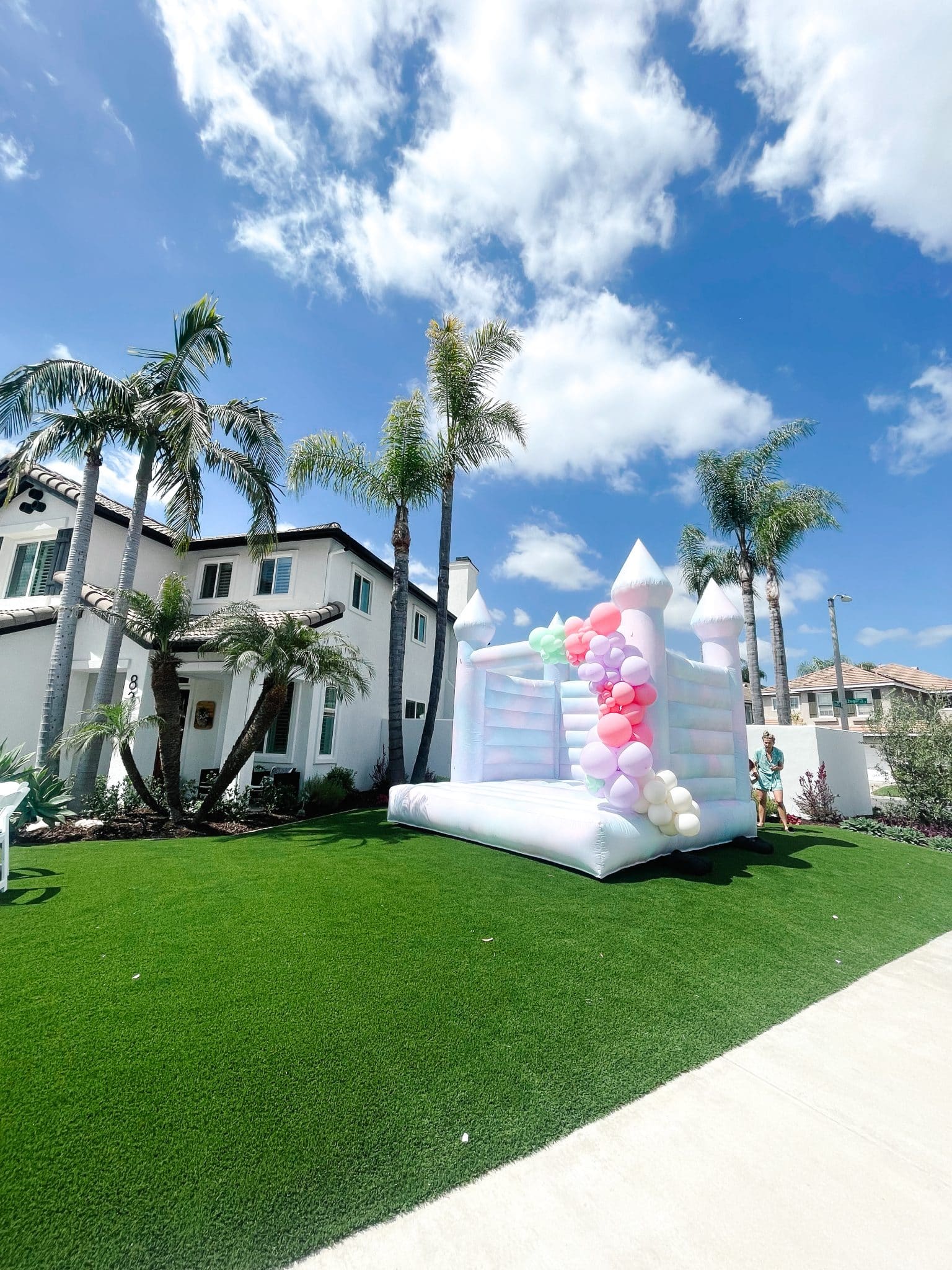 Pastel Tie Dye Bounce House for a backyard party